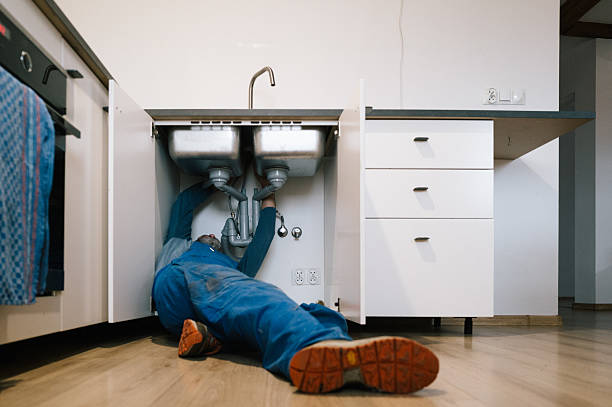 Professional Drain Cleaning technician working in Centerton, AR